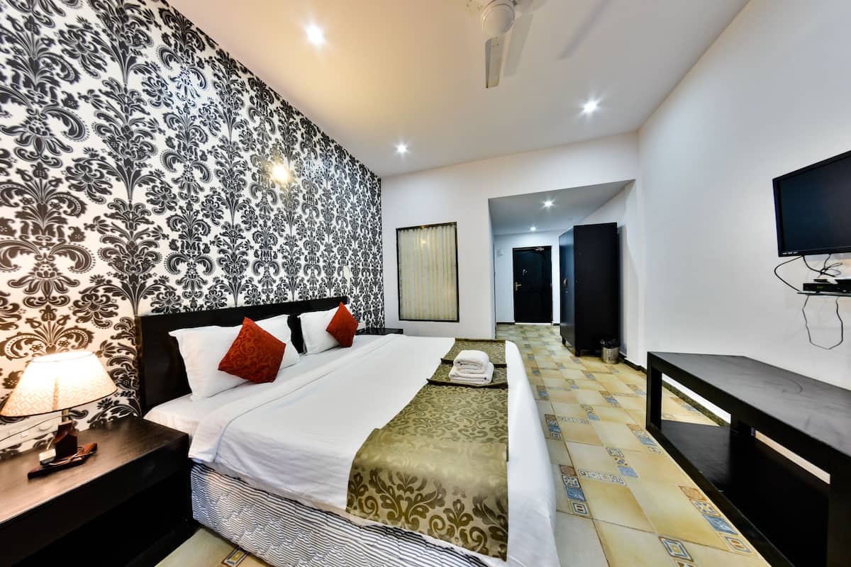 Kamar Double Premium | Tirai kedap cahaya, tempat tidur lipat/tambahan, dan Wi-Fi gratis