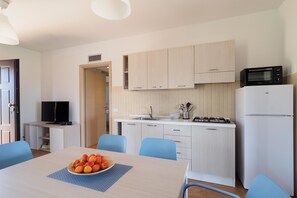 Ferienhaus, 2 Schlafzimmer | Essbereich im Zimmer