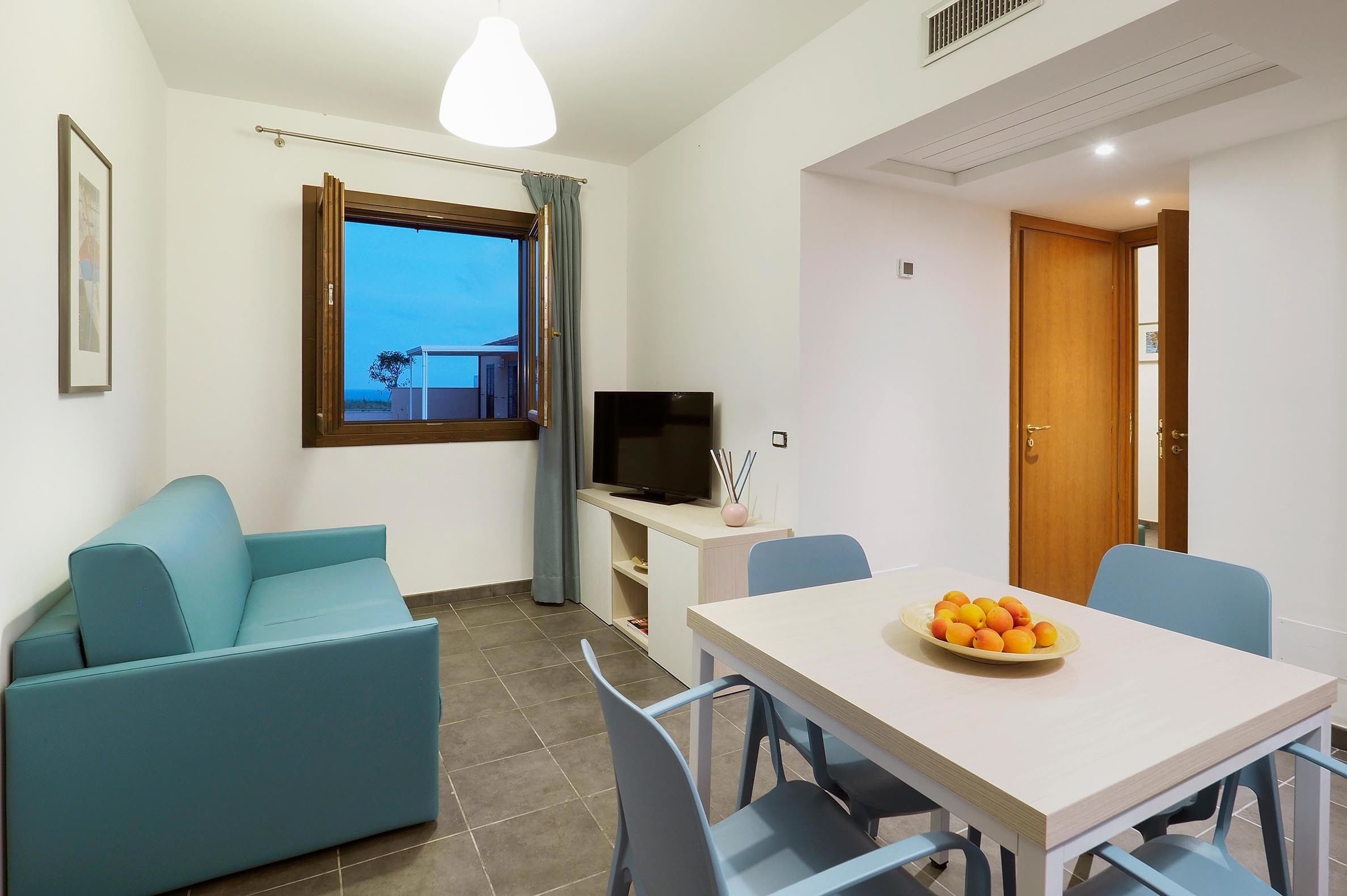 House, 2 Bedrooms | Living area | 18-inch flat-screen TV with satellite channels, TV