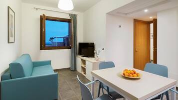 House, 2 Bedrooms | Living area | 18-inch flat-screen TV with satellite channels, TV
