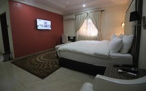 Presidential Room | In-room safe, desk, laptop workspace, iron/ironing board