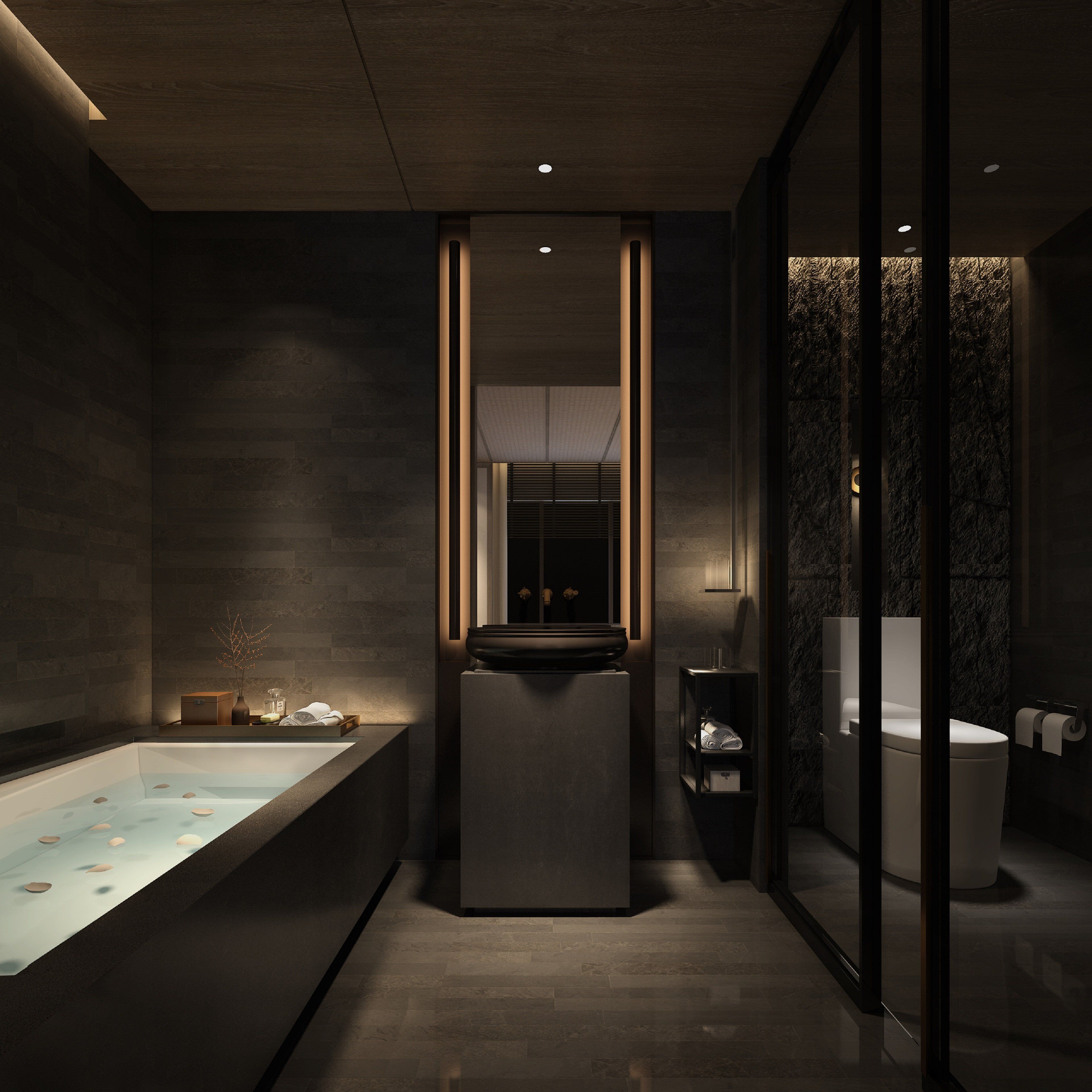 A modern bathroom with a freestanding bathtub, a toilet, and a vanity.