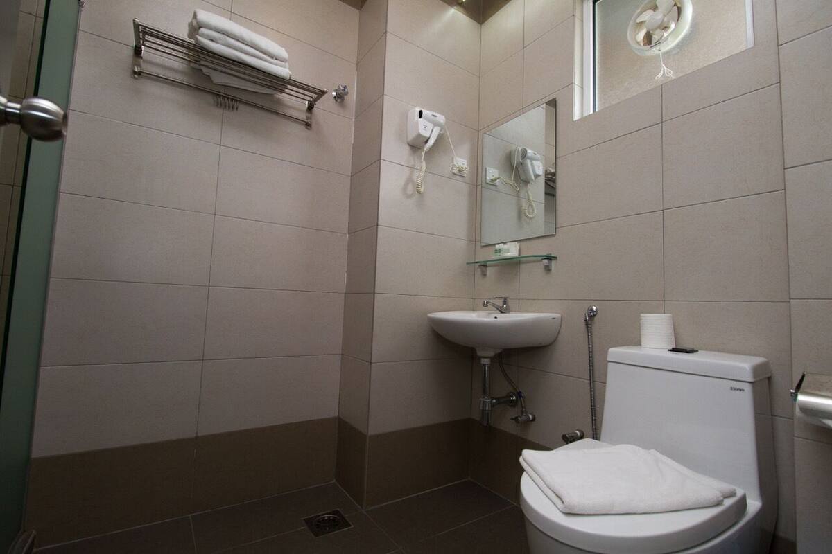 Family Triple Room, Multiple Beds | Bathroom | Free toiletries, slippers, bidet, towels