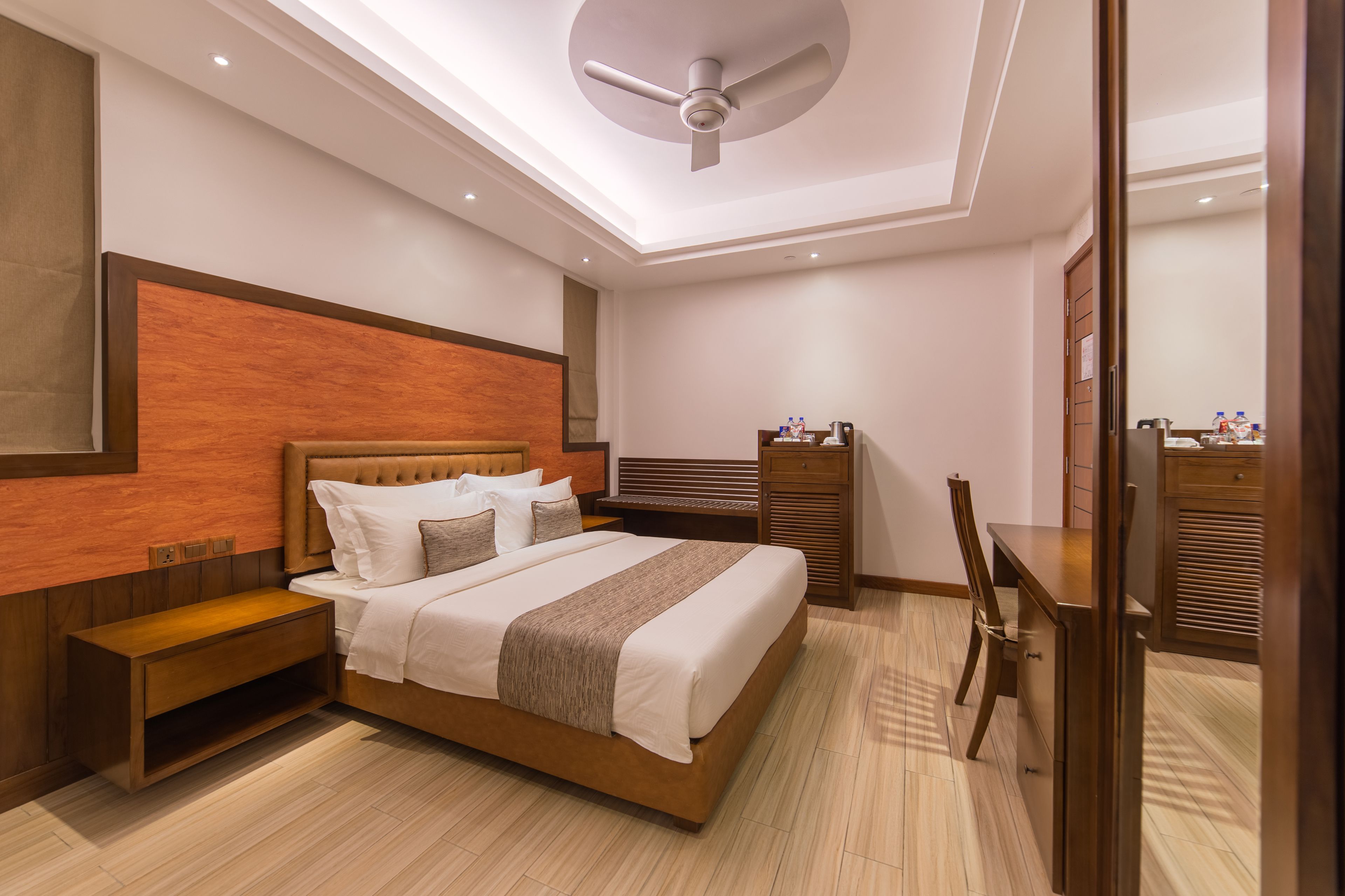 super deluxe room with balcony & free return airport transfer | premium bedding, minibar, in-room safe, soundproofing