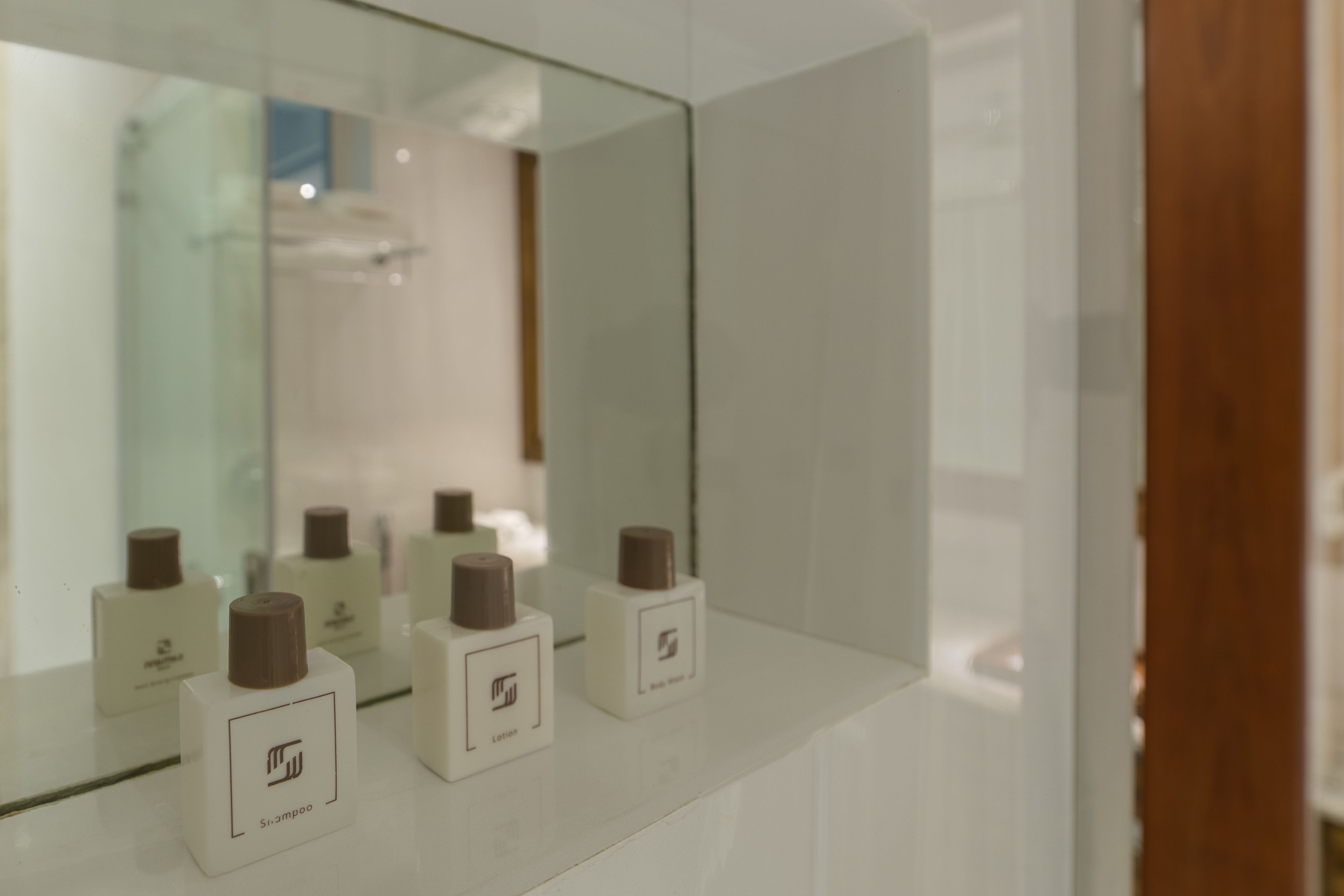 executive suite-balcony view with free return airport transfer | bathroom amenities | shower, free toiletries, slippers, bidet