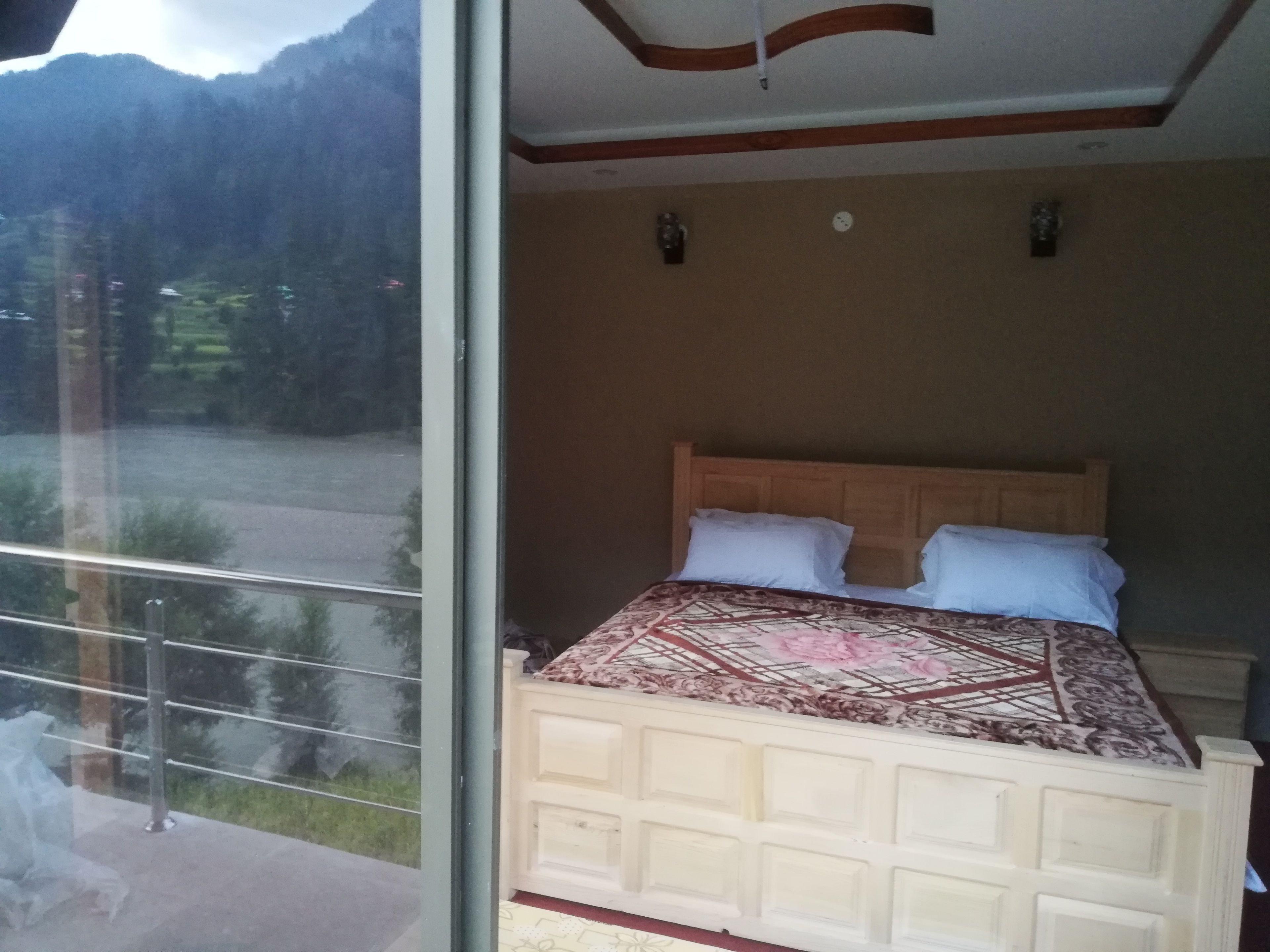 Deluxe Room, 1 King Bed, Smoking, River View | Down duvets, memory-foam beds, individually decorated