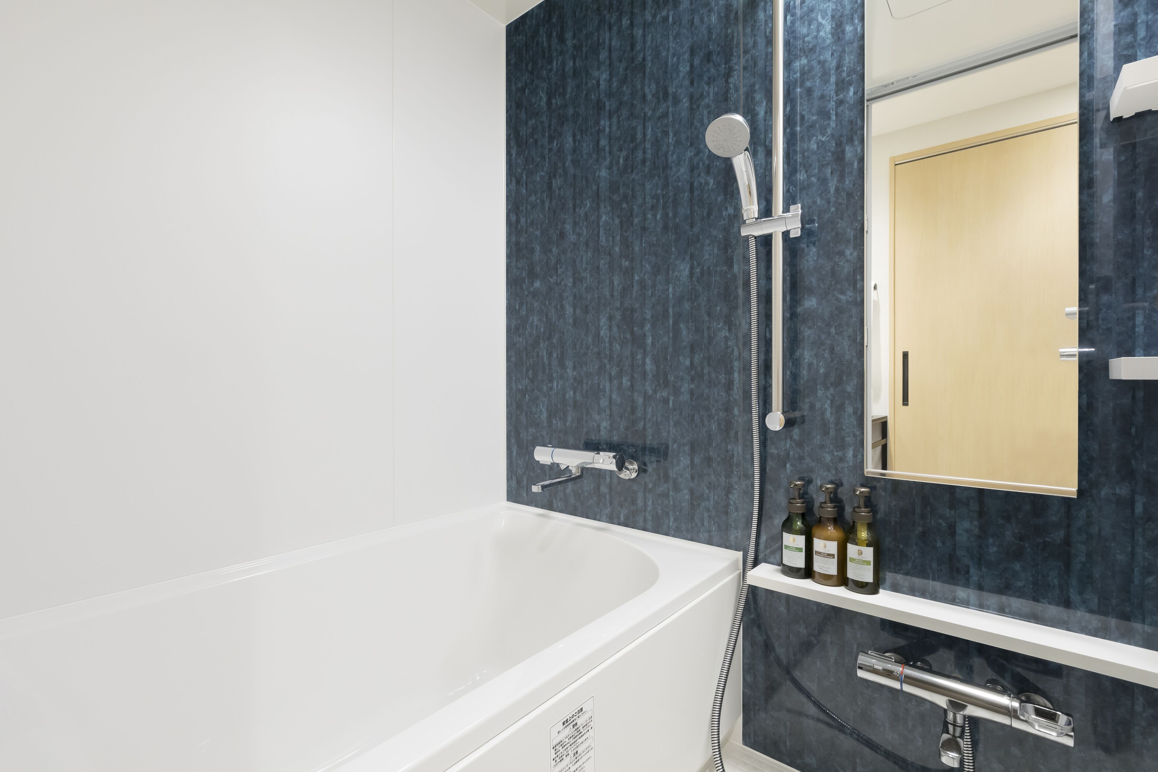 superior triple room | bathroom | free toiletries, hair dryer, slippers, electronic bidet