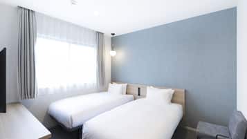 Tvåbäddsrum | Värdeförvaringsskåp på rummet, strykjärn/strykbräda och gratis wi-fi