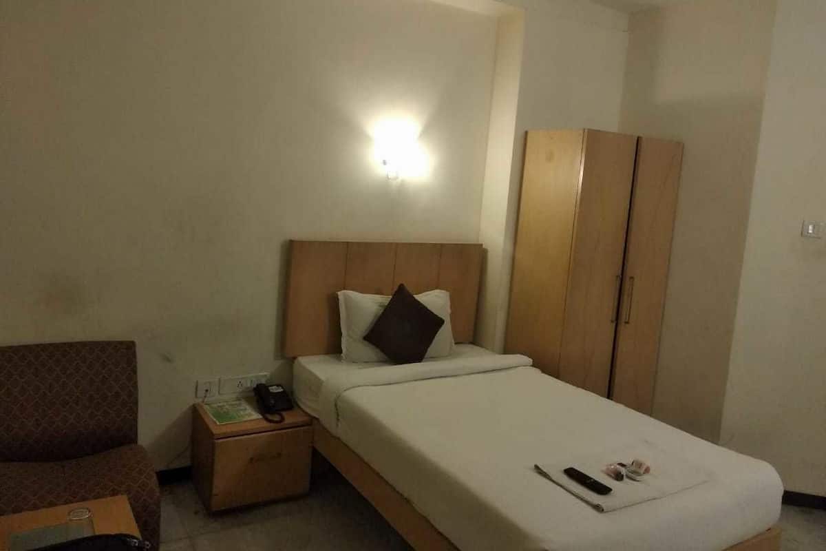 Quarto solteiro standard | Wi-Fi de cortesia, roupa de cama