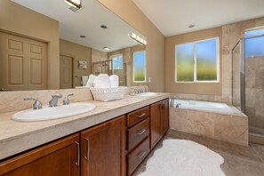 Bathtub, jetted tub, hair dryer, towels