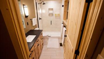 Combined shower/tub, hair dryer, towels, soap