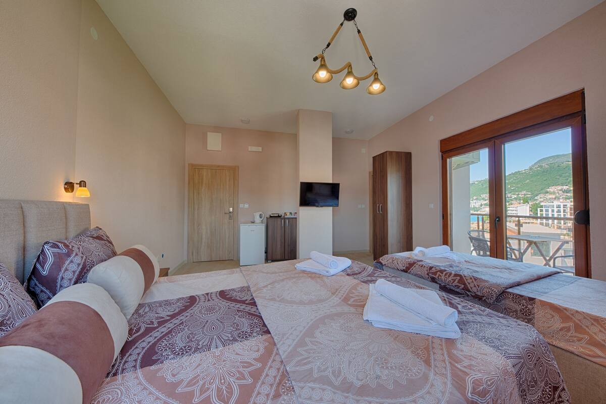 Exclusive Room, Multiple Beds | Minibar, blackout drapes, soundproofing, iron/ironing board (on request)
