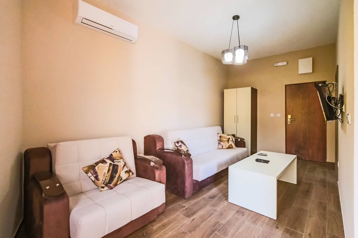 Exclusive Apartment, 1 Bedroom, Mountain View | Living area | Plasma TV