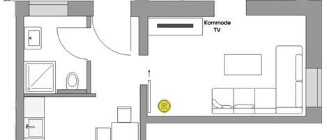 A floor plan of a hotel with a terrace, TV room, and a garden area.