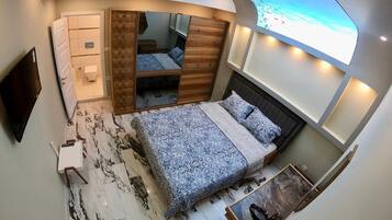 Luxe appartement, 1 slaapkamer | 1 slaapkamer, een laptopwerkplek, verduisterende gordijnen