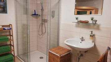 Apartment | Bathroom | Separate tub and shower, hair dryer, towels, shampoo