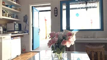 Traditional Cottage, Lake View, Lakeside (on an Island) | Private kitchenette | Microwave, stovetop, cookware/dishes/utensils, cleaning supplies