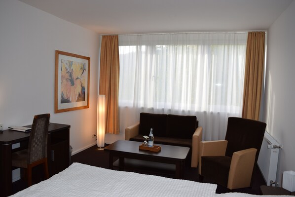 Deluxe-Doppelzimmer | Wohnbereich