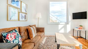 Apartment, 3 Bedrooms | Living room | Flat-screen TV