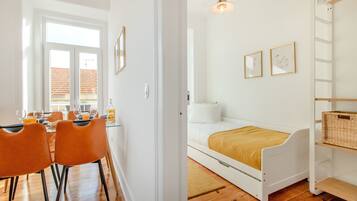 Apartment, 3 Bedrooms | Living area | Flat-screen TV