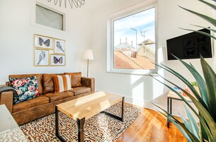 Apartment, 3 Bedrooms | Living room | Flat-screen TV