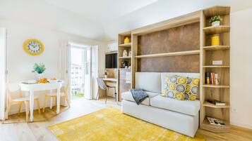 Apartment, 1 Bedroom | Living area | Flat-screen TV