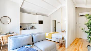 Apartment, 1 Bedroom | Living area | Flat-screen TV