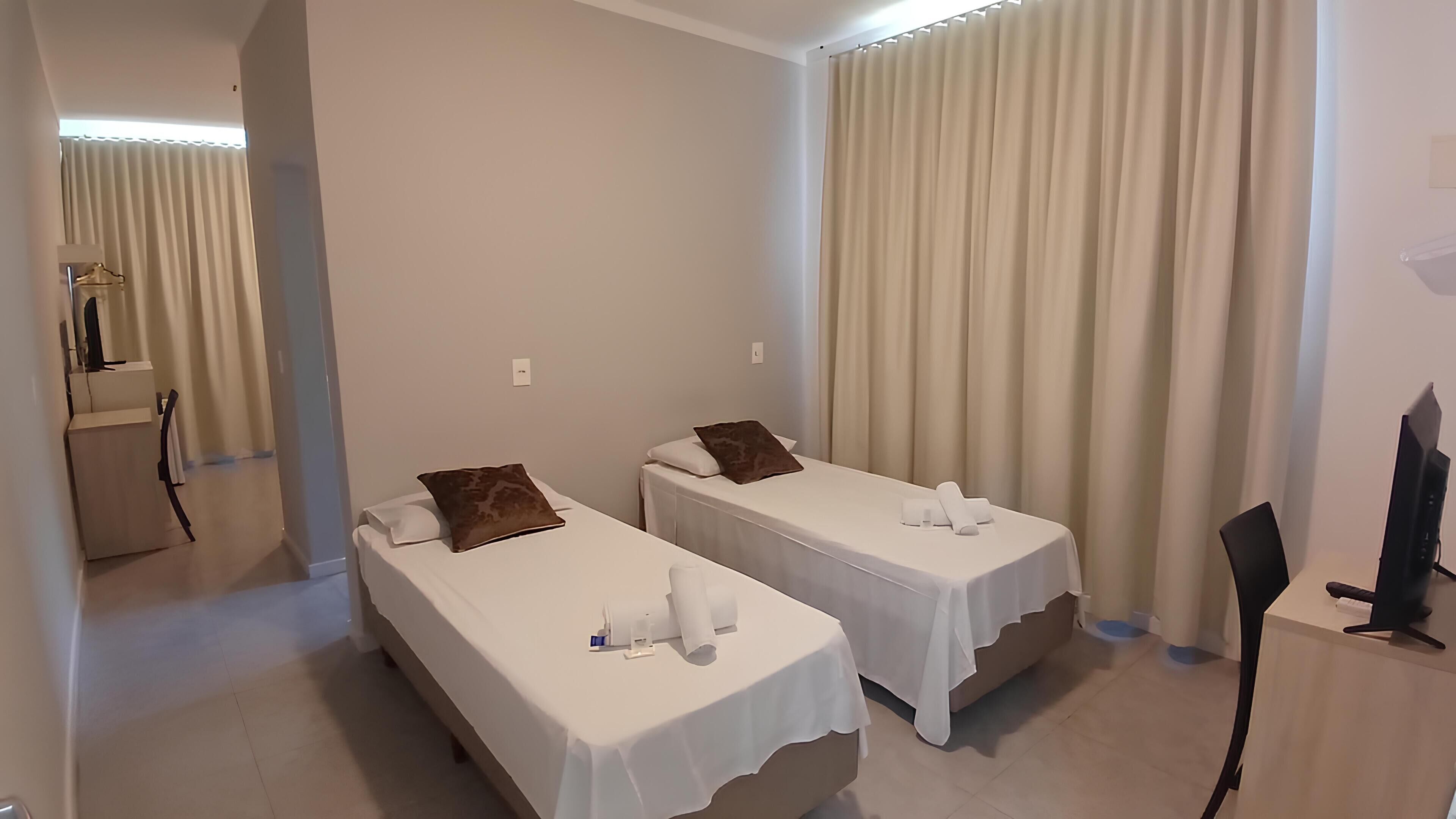 Desk, laptop workspace, blackout curtains, iron/ironing board