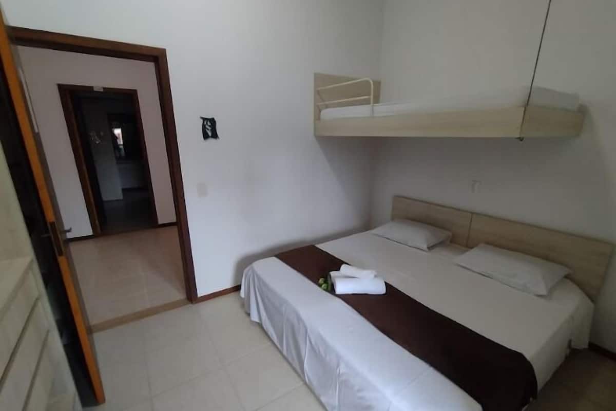 Comfort Room | Desk, laptop workspace, blackout drapes, iron/ironing board
