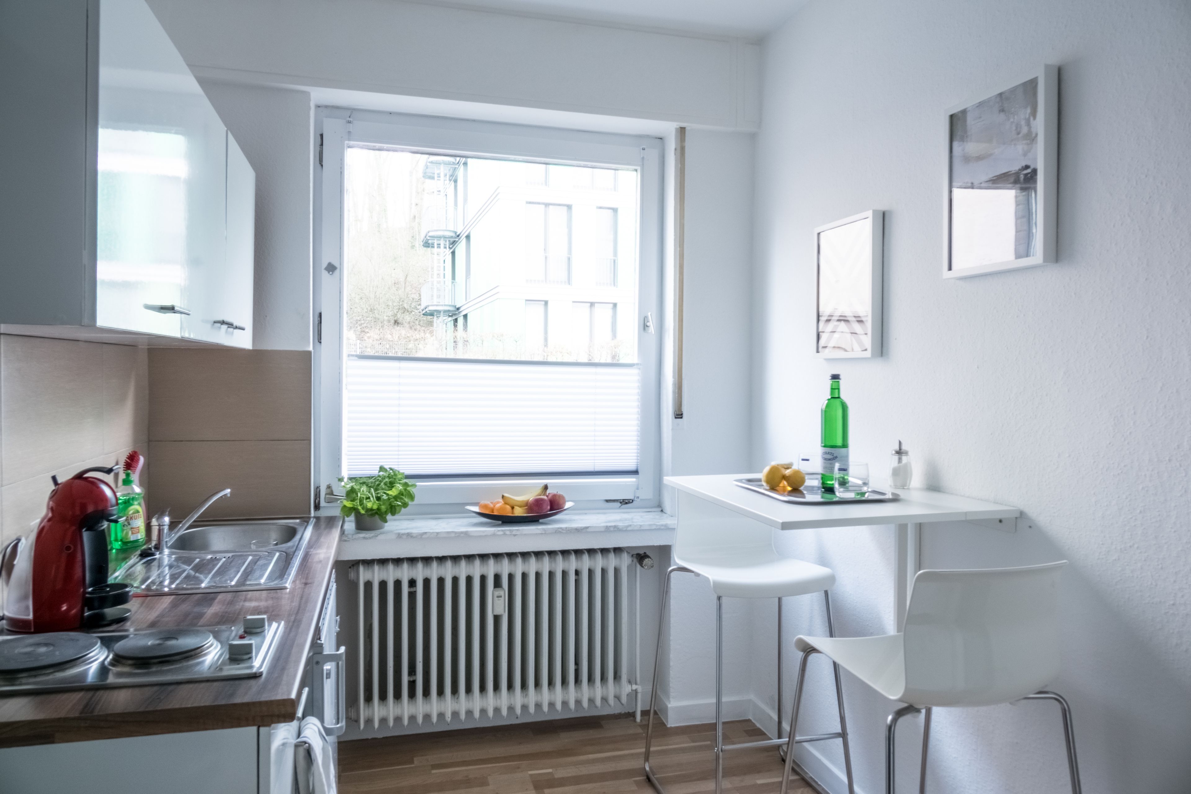 Modern Business Apartment near the HBF | Private kitchen | Full-sized fridge, microwave, stovetop, espresso maker
