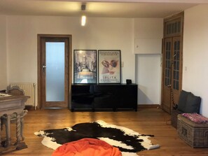 Apartment, 1 Bedroom | Living area | Flat-screen TV