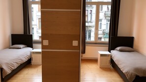 Appartement, 1 slaapkamer | 1 slaapkamer, verduisterende gordijnen, een strijkplank/strijkijzer