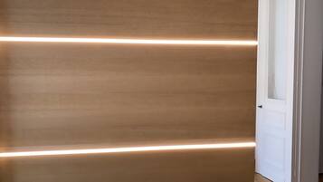 Apartment, 1 Bedroom | 1 bedroom, blackout curtains, iron/ironing board, cots/infant beds