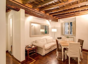 Family Apartment, 4 Bedrooms, City View | Living area | Flat-screen TV - HI Navona apartment (Rome)