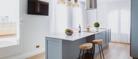 Deluxe Apartment, 1 Bedroom, Partial Sea View (Penthouse) | Private kitchen | Coffee/tea maker, full-size fridge, microwave, oven