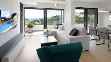Apartment, Meerblick (MM4) | Wohnbereich | Flachbildfernseher