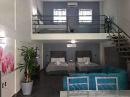 Family Studio Suite | Down comforters, blackout drapes, iron/ironing board, free WiFi