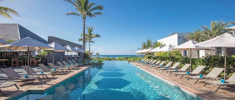 2 outdoor pools, pool umbrellas, pool loungers