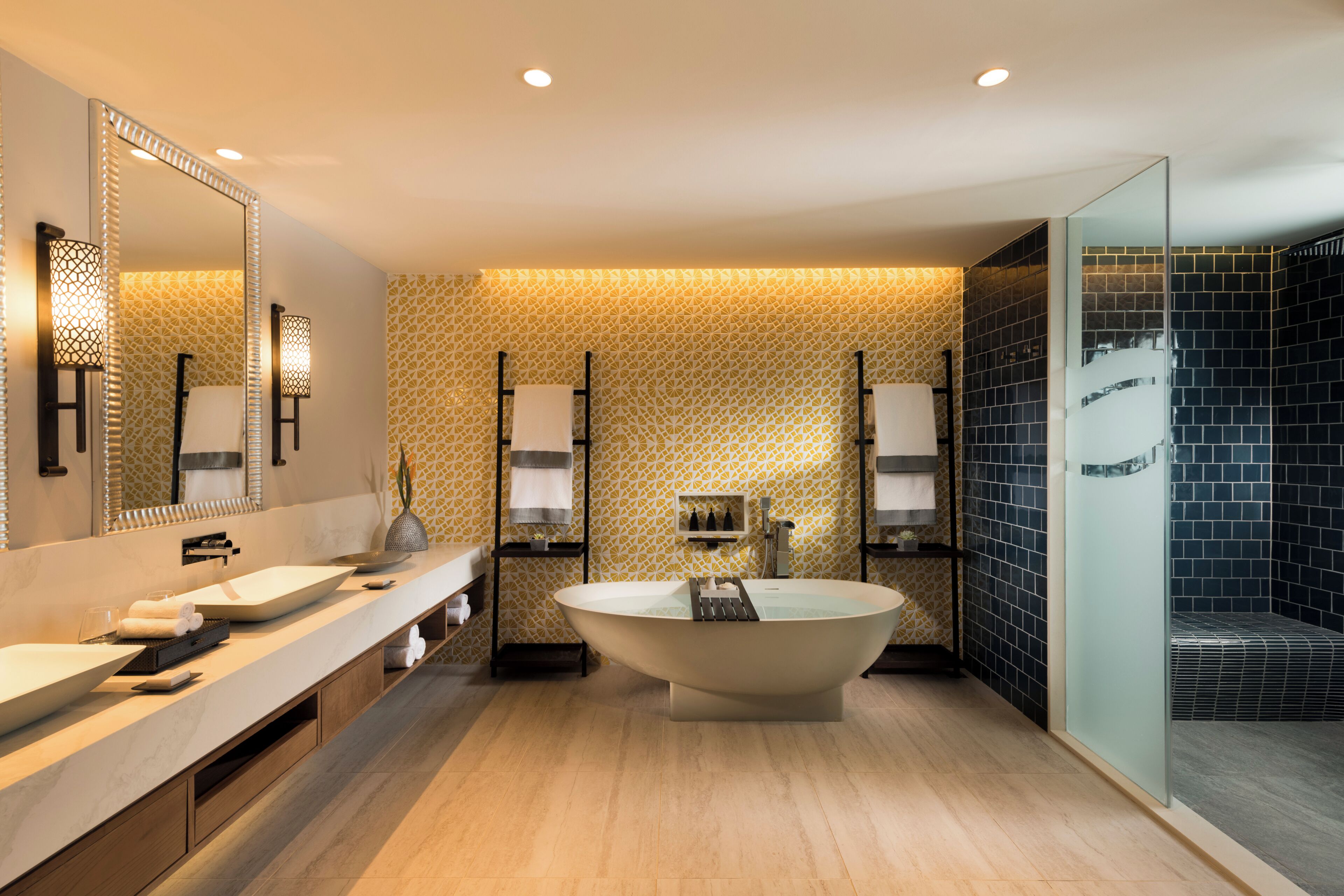 Suite, Garden View | Bathroom | Separate tub and shower, rainfall showerhead, free toiletries