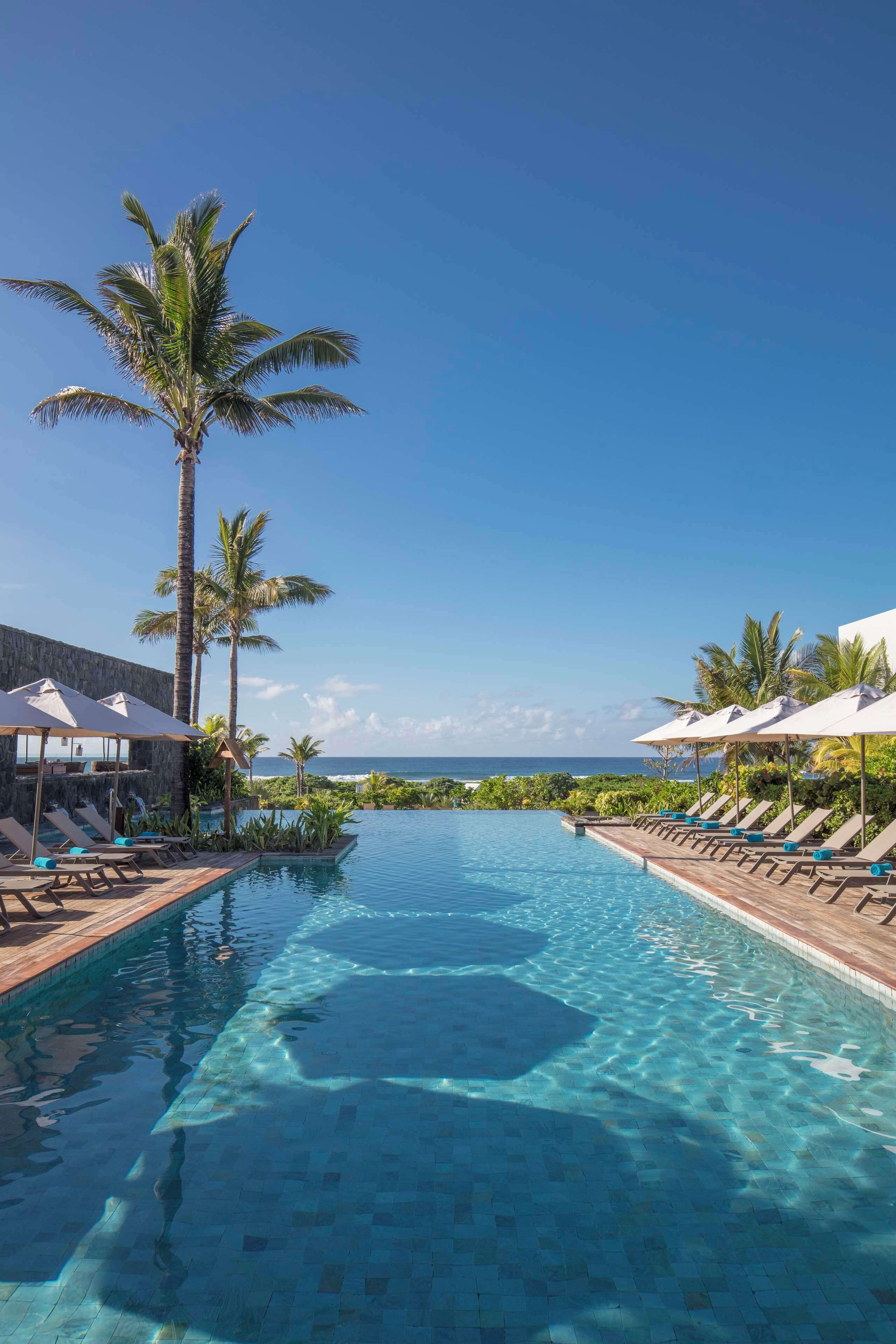 2 outdoor pools, pool umbrellas, pool loungers