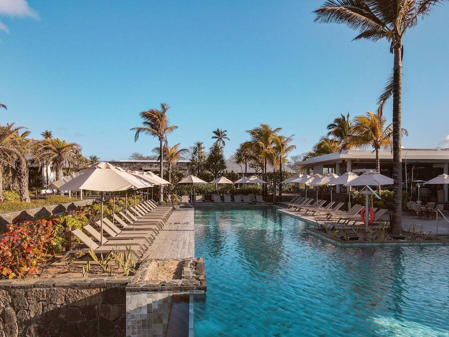 2 outdoor pools, pool umbrellas, pool loungers