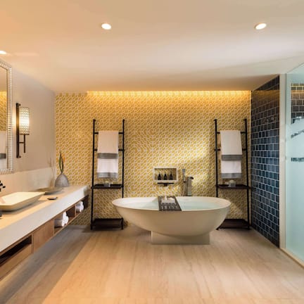 Separate tub and shower, rainfall showerhead, free toiletries