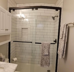 Shower, hair dryer, towels, soap
