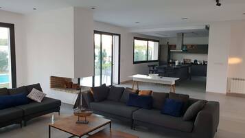 Superior Villa | Living area | 52-inch flat-screen TV with satellite channels, TV, fireplace