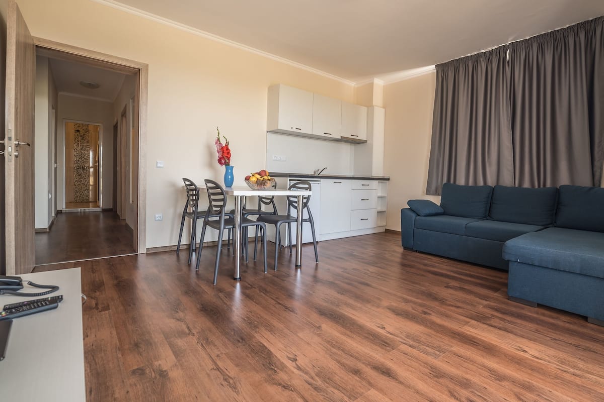 Family Apartment, 2 Bedrooms, Lanai | Living area | Flat-screen TV