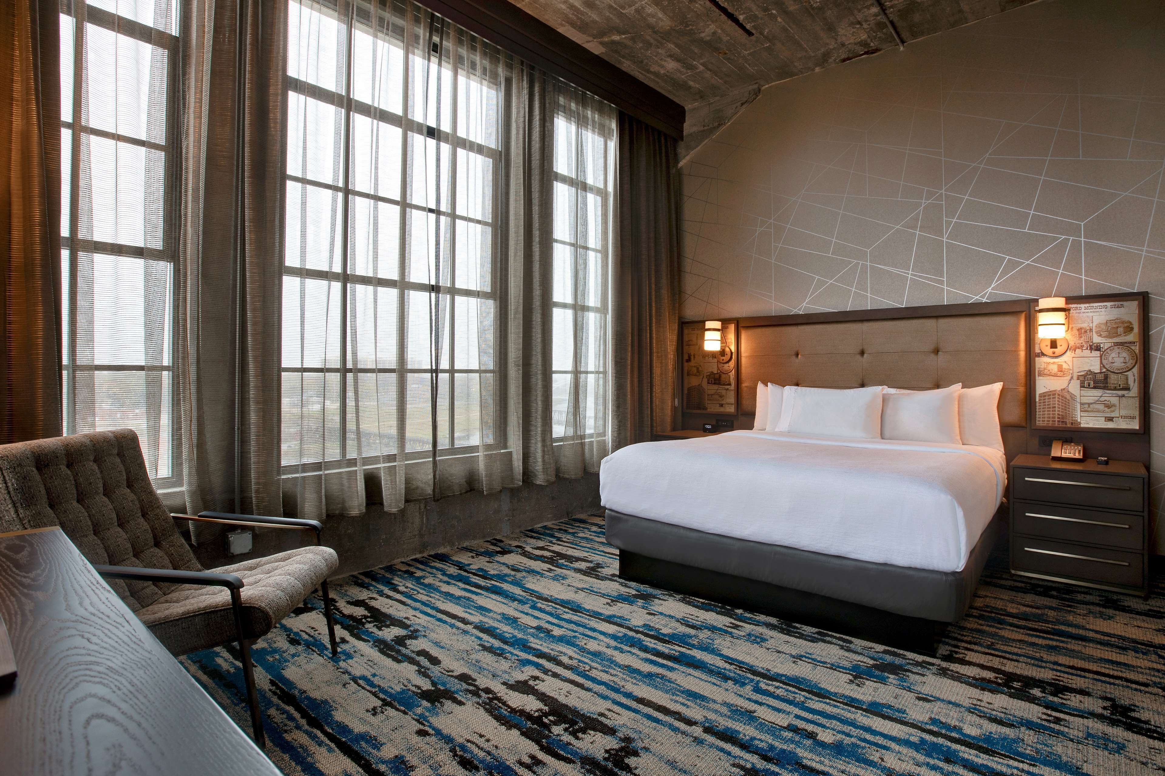 suite, 1 king bed, river view | in-room safe, desk, laptop workspace, wifi