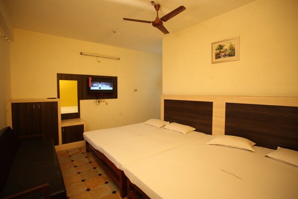 Economy Double Room, 2 Bedrooms | Individually furnished, iron/ironing board, cribs/infant beds