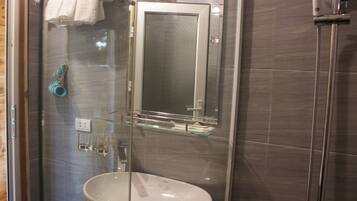 Shower, slippers, towels, soap