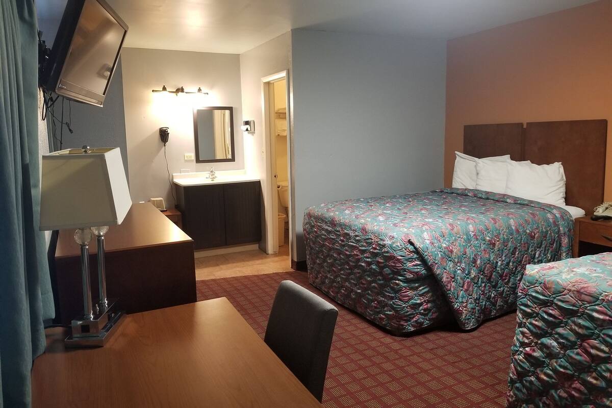 Room, 2 Queen Beds, Smoking | Individually furnished, desk, blackout curtains, soundproofing