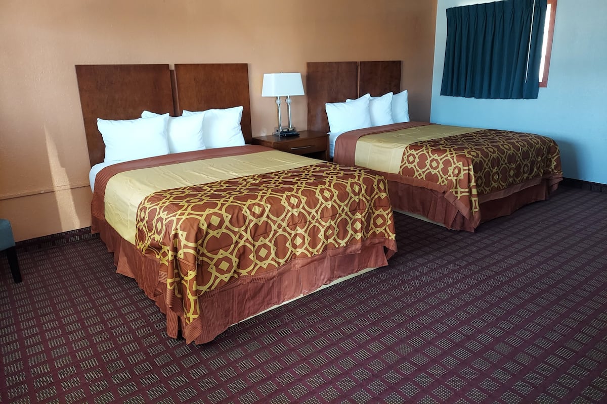 Room, 2 Queen Beds, Non Smoking | Individually furnished, desk, blackout curtains, soundproofing